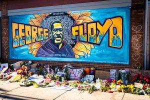 George Floyd protests power on as he is put to rest